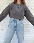 The grey speckled Henley (L)