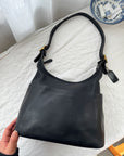 The Vintage Coach Hobo Bag