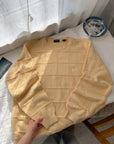 The Pale Yellow Checkered Sweater (L)