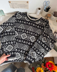 The Black & White Sun Peak Sweater (L)