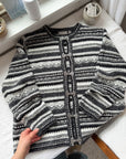 The Newspaper Clasp Cardigan (L)